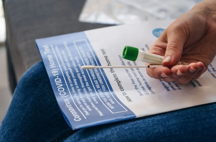Pandemic drug, shot and test makers Pfizer and Roche pen COVID awareness collab